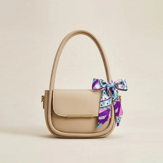 Chic Nude Handbag with Vibrant Silk Bow