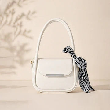Classic White Handbag with Zebra-Striped Bow