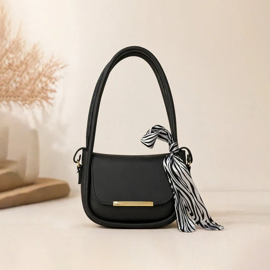 Chic Black Handbag with Zebra-Print Silk Bow